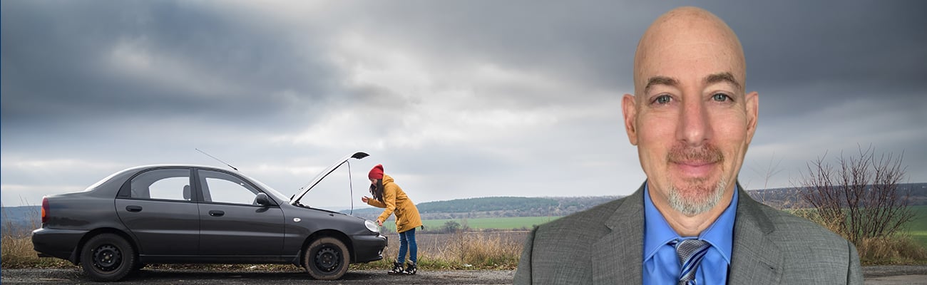 Young Woman With Broken Car in The Middle of The Road